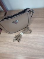 Bolsa formato Canoa Logo Triangular